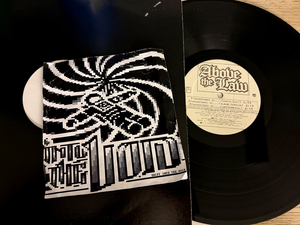 Above_The_Law-Adventures_Of-Promo-VLS-FLAC-1997-THEVOiD